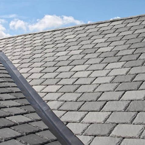 slate roof with sky in background