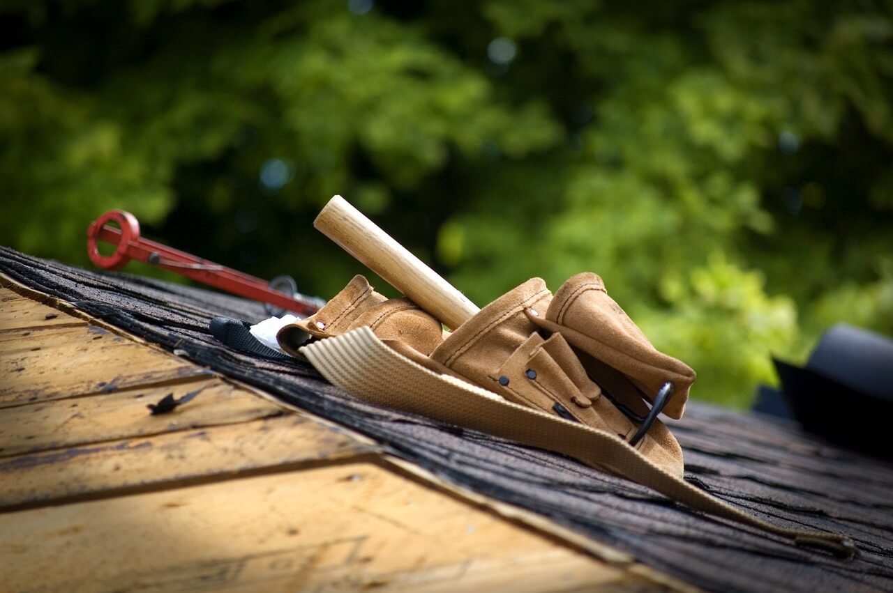roofer tools resting on a new roof